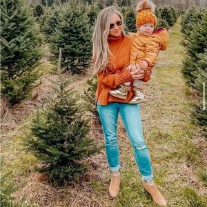 Chelsea and Theodore fringe sweater